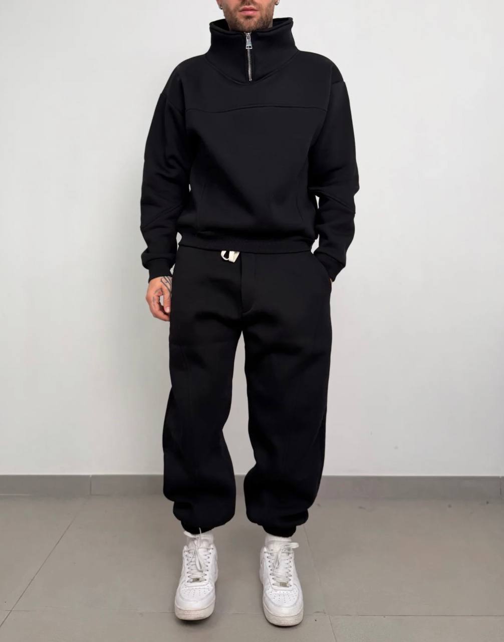 TUTA COMPLETA COLLO ZIP NERA