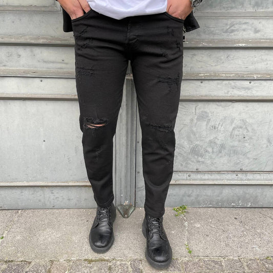 jeans nero strappi